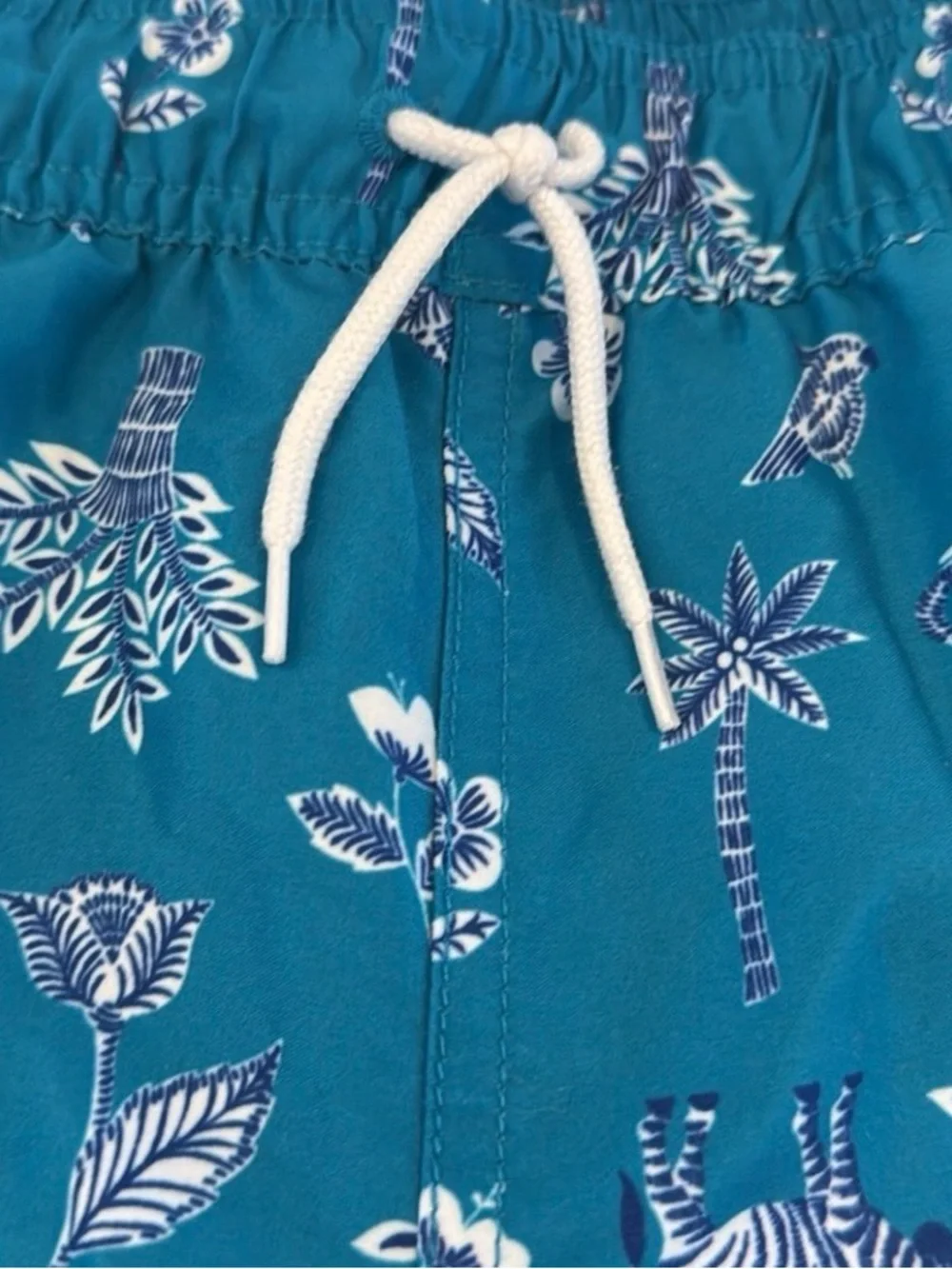 Janie and Jack Teal World Love Swim Trunks with Animal Print